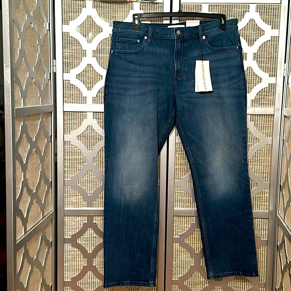 NWT Calvin Klein Women’s dark jeans width 36 inches length 30 inches